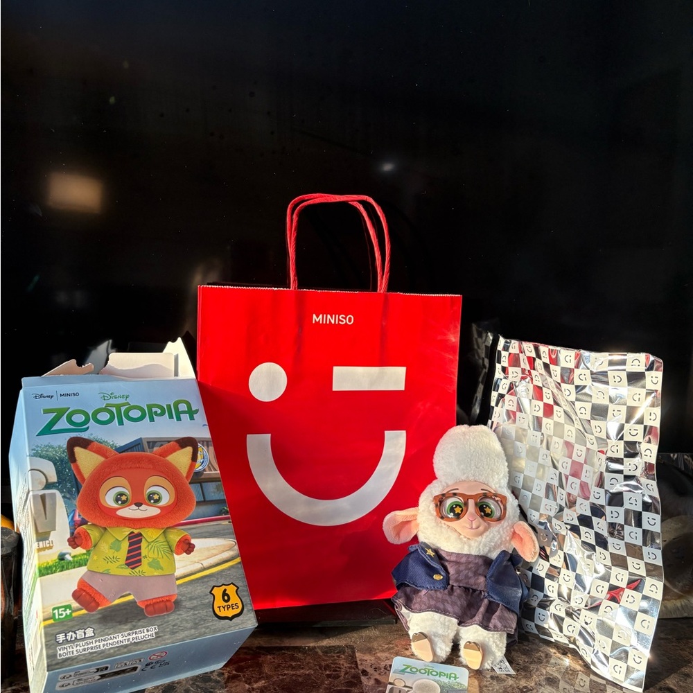 Disney Zootopia Bellwether Plush with Red Miniso Bag.